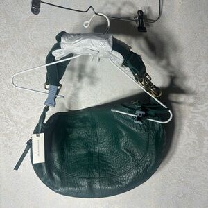 Anthropologie green leather shoulder bag with gold Accents adjustable straps